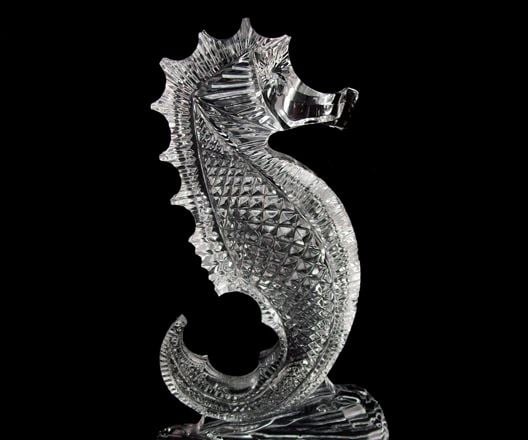 Why is the seahorse the trademark of Waterford Crystal?